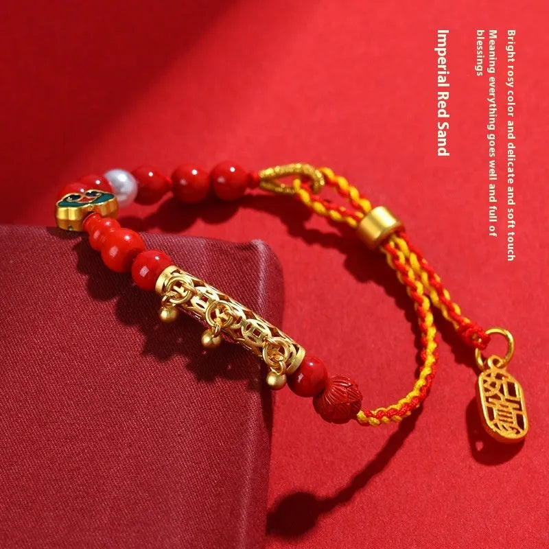 Women's cinnabar bracelet with hand-woven red sand rope and small round bell charm