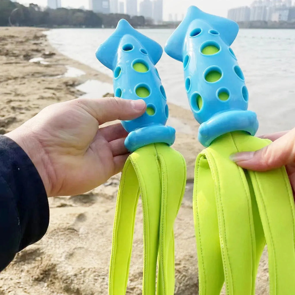 Blue cuttlefish-shaped dog chew toy with textured surface and squeaker for teeth cleaning