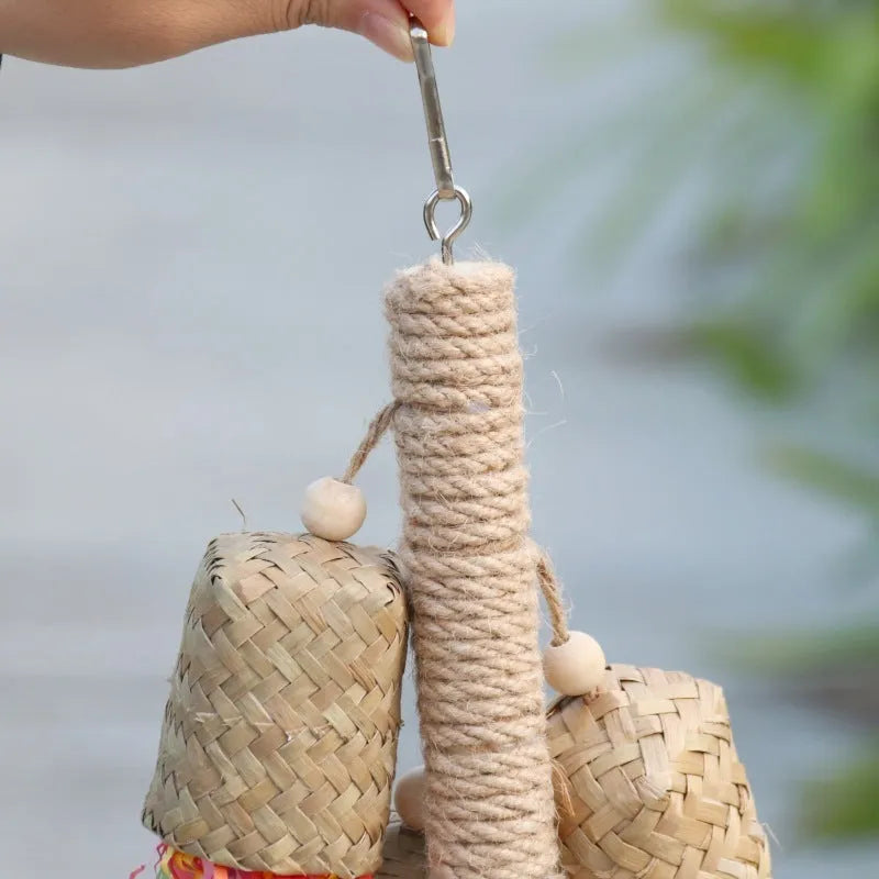 Parrot foraging toy made of wood and sisal rope with colourful shredded paper inserts