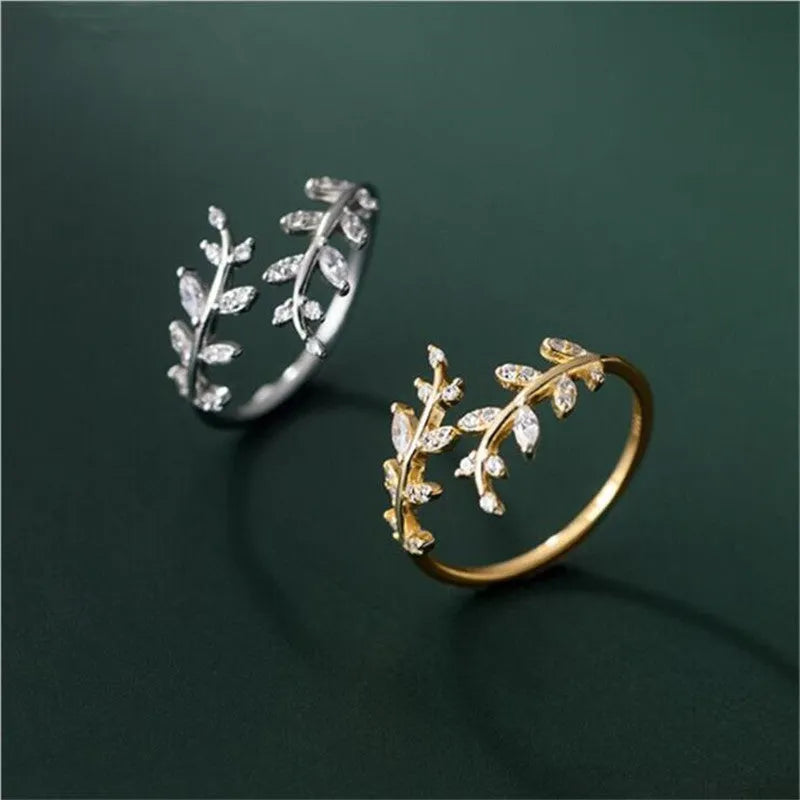 Women's leaf-shaped branch ring in electroplated copper, shown in silver and gold colour options.