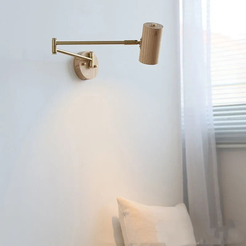 Retro-style long-arm wall spotlight with rotating head in walnut finish and a ribbon pull switch.