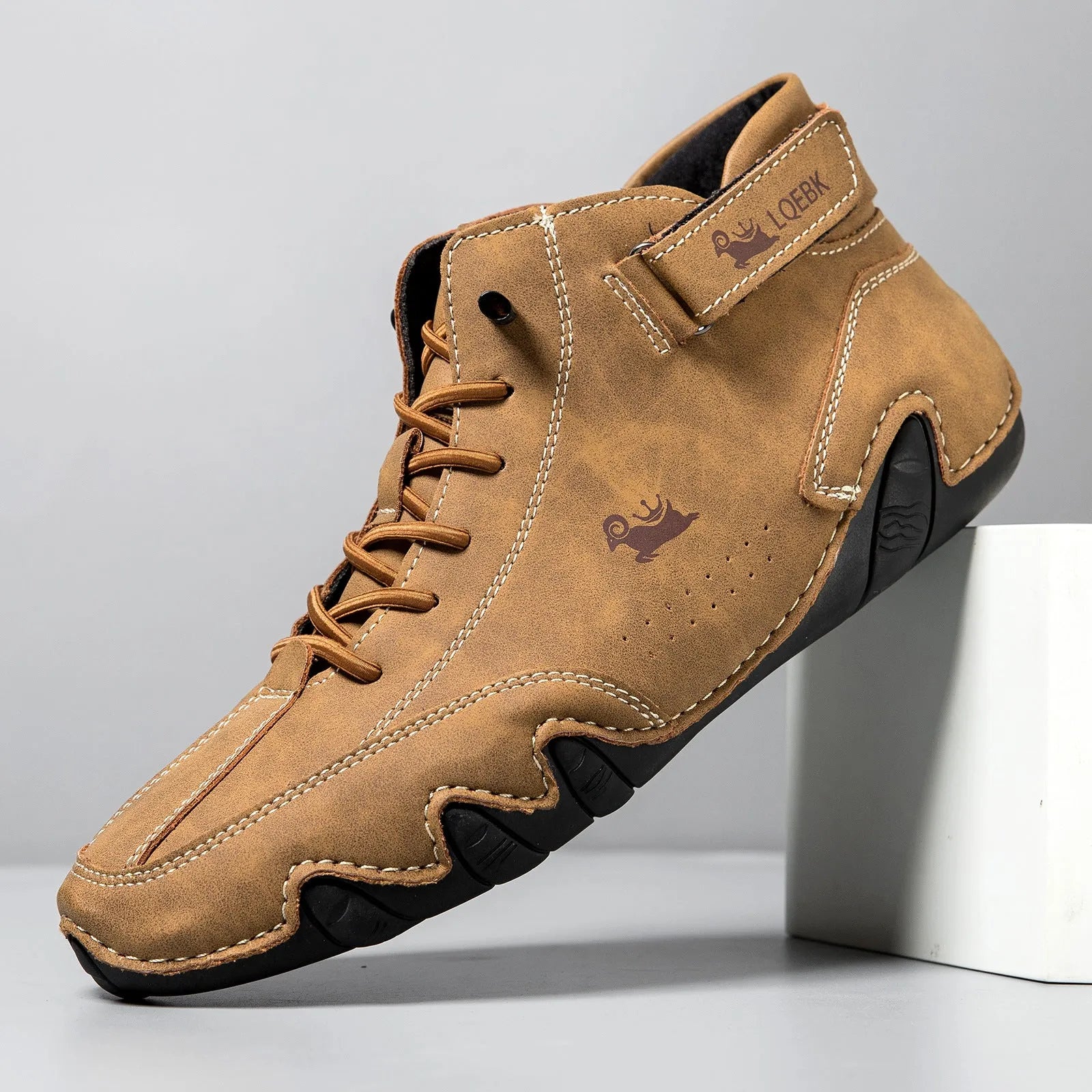 Men's brown high-top casual Martin boots with round toe and flat rubber sole.