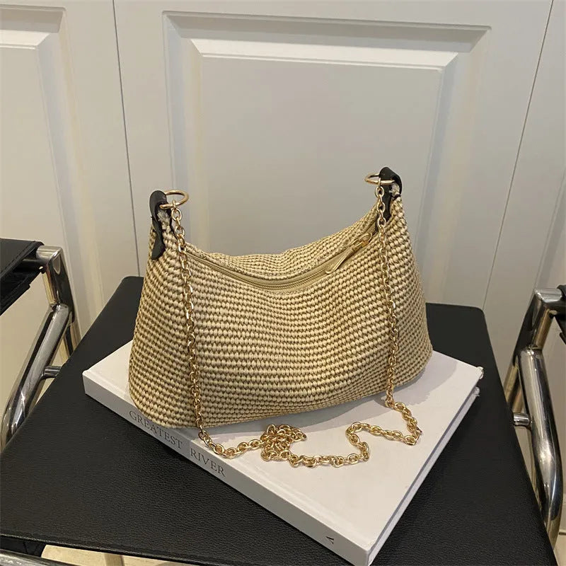 Woven straw crossbody handbag in horizontal square shape with phone compartment