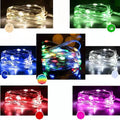 Flexible copper wire LED string lights bent into a spiral shape, showing 120 small bulbs and a white control box.