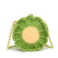 Hand-woven wool bag with crocheted flowers in round shape showing cotton lining and phone pocket