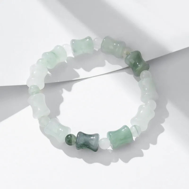Natural chalcedony jade and coconut shell bead bracelet with diamond shapes and a safety lock clasp.