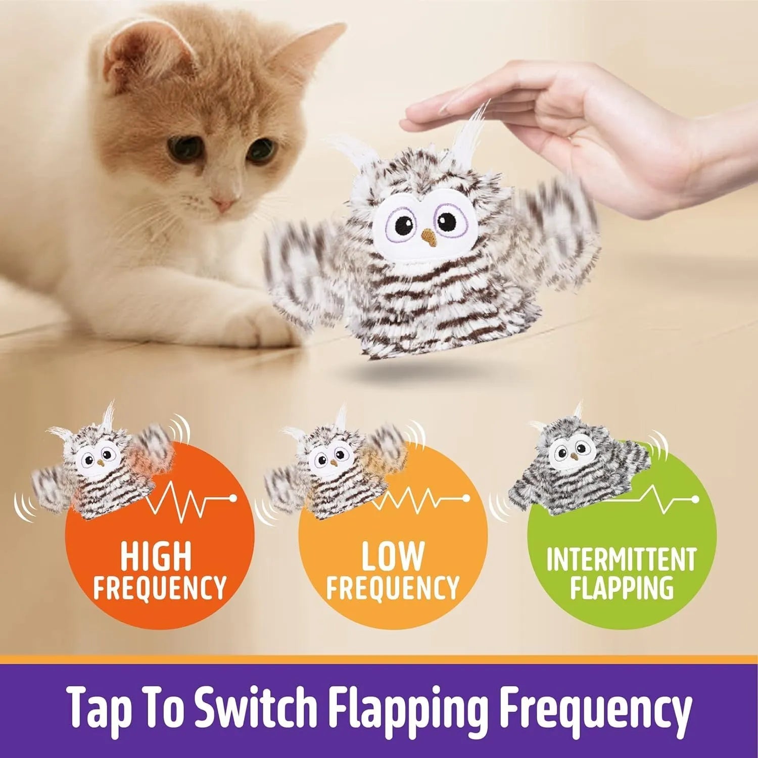 Grey automatic owl cat toy with flapping wings on a flat surface