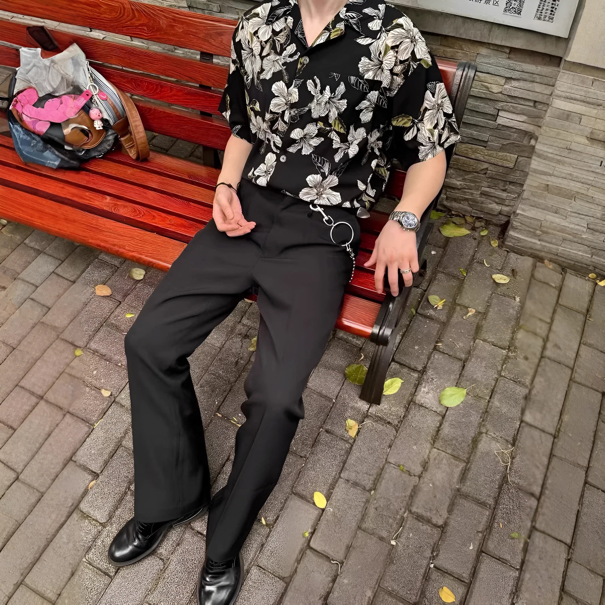 Black men's vintage Cuban collar shirt with printed floral pattern, made from thin ice silk fabric.