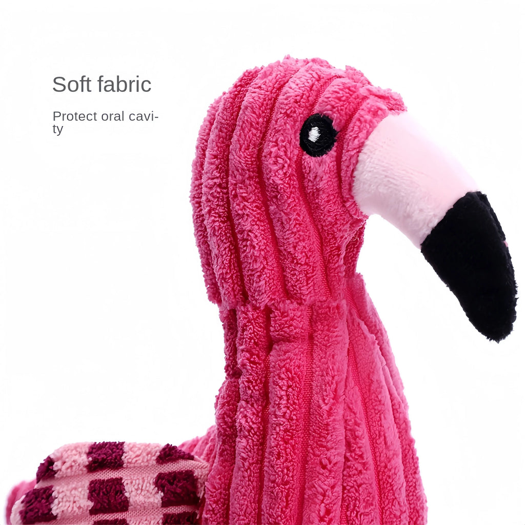 Pink corduroy animal-shaped plush dog toy with a squeaker inside on a neutral background.
