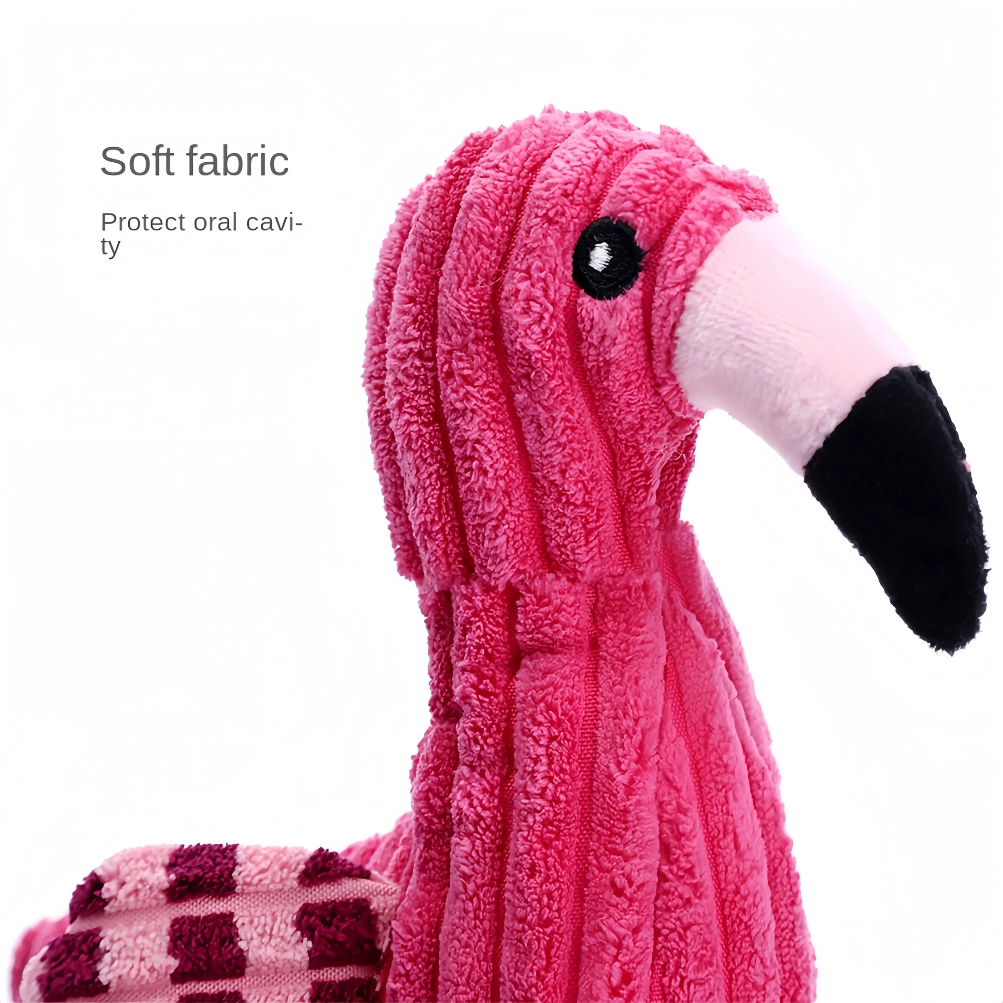 Pink corduroy animal-shaped plush dog toy with a squeaker inside on a neutral background.