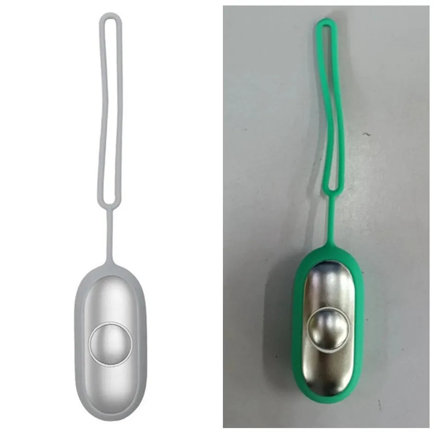 Handheld micro-current sleep aid device in grey, green, or orange colours with USB charging cable
