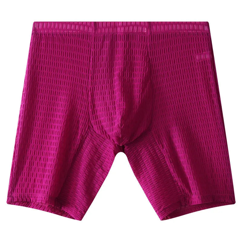 Men's white lace boxer shorts with a lengthened leg and mid-waist design on a plain background.