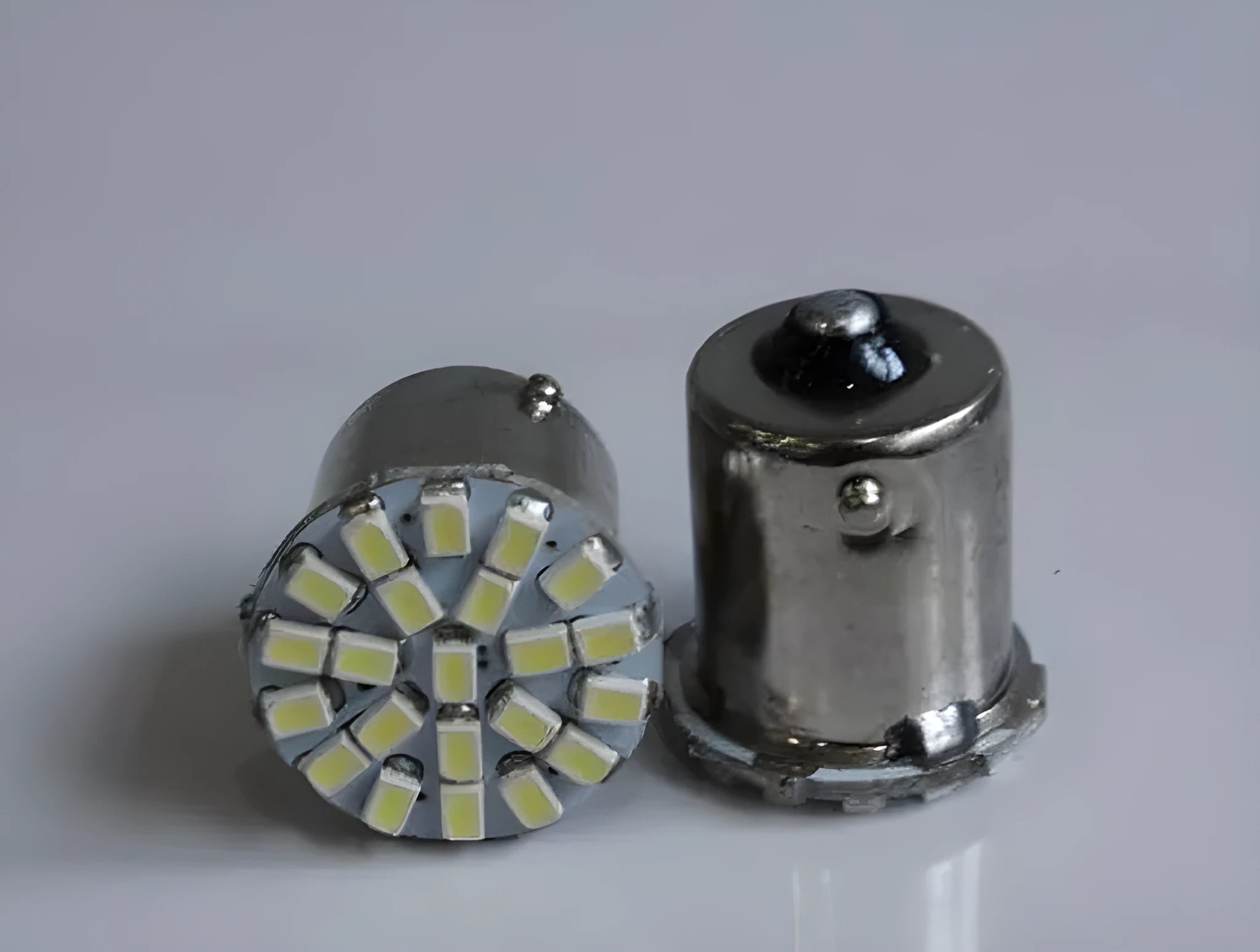 1156 1157 automotive LED bulb with 22 white LEDs for brake and turn signals.