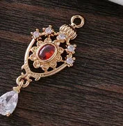 Micro inlaid zircon crown hollow water drop-shaped copper pendant in electroplated colour.