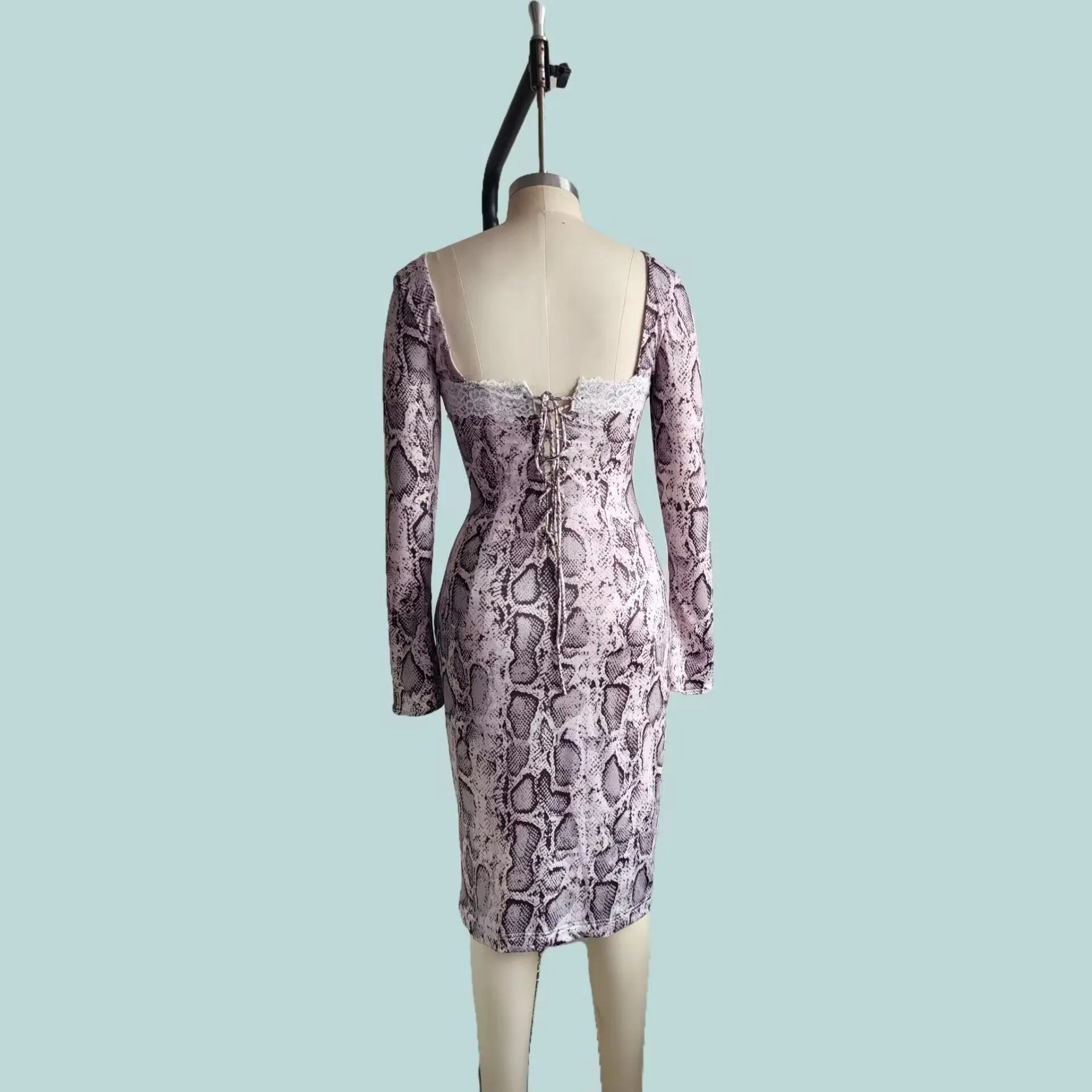 Grey slim fit women's lace dress with long sleeves, A-line skirt, and a digital 3D printed pattern.