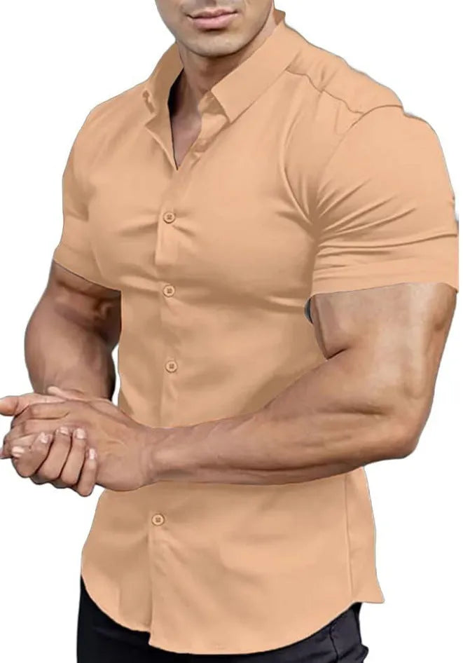 Man wearing a brown short sleeve printed casual shirt with a collar.