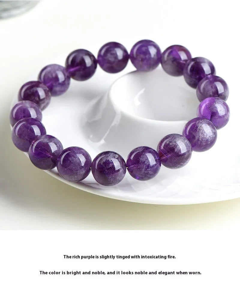 Natural feather amethyst crystal bracelet in snow mountain purple colour with scattered beads.