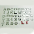 Zinc alloy metal car sticker with 3D raised English letter measuring 2.5cm in black finish