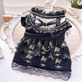 Golden gothic-style skirt for a small dog or cat on a mannequin, showing princess design.