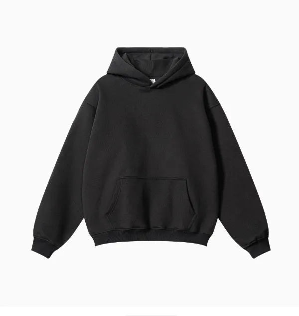 A loose-fitting men's cotton hooded sweater in a pullover style on a hanger.
