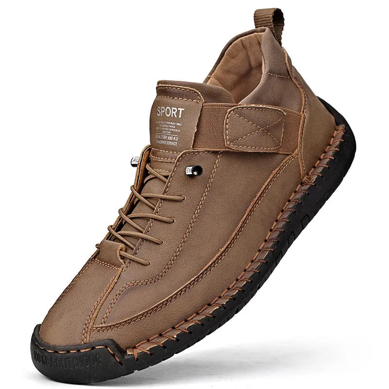 Men's mid-calf Martin boots in khaki with visible tooling stitching and an elastic band across the instep.