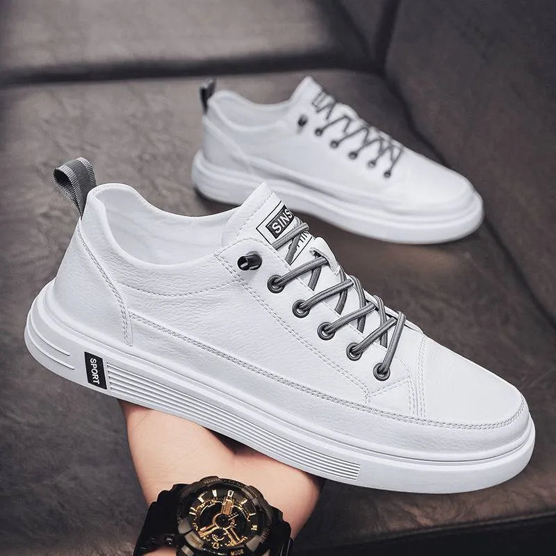 Men's low-heel casual trainers in beige, white, and black colours, showing round toe and Korean style.