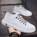 Men's low-heel casual trainers in beige, white, and black colours, showing round toe and Korean style.