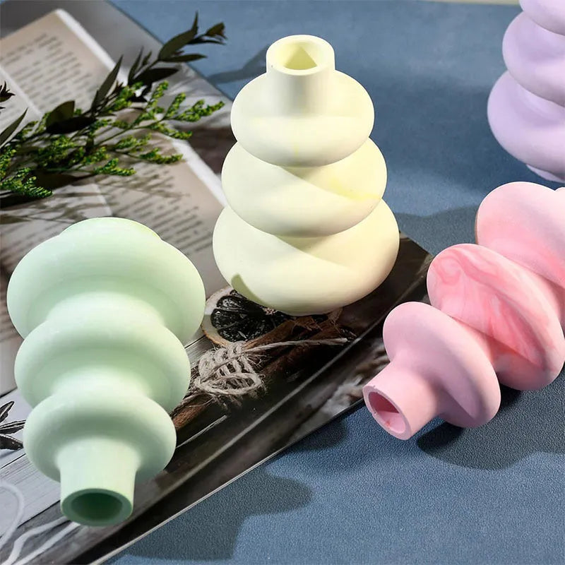 Three layer circle vase ornament silicone mould in irregular shape, shown in large and small size options.