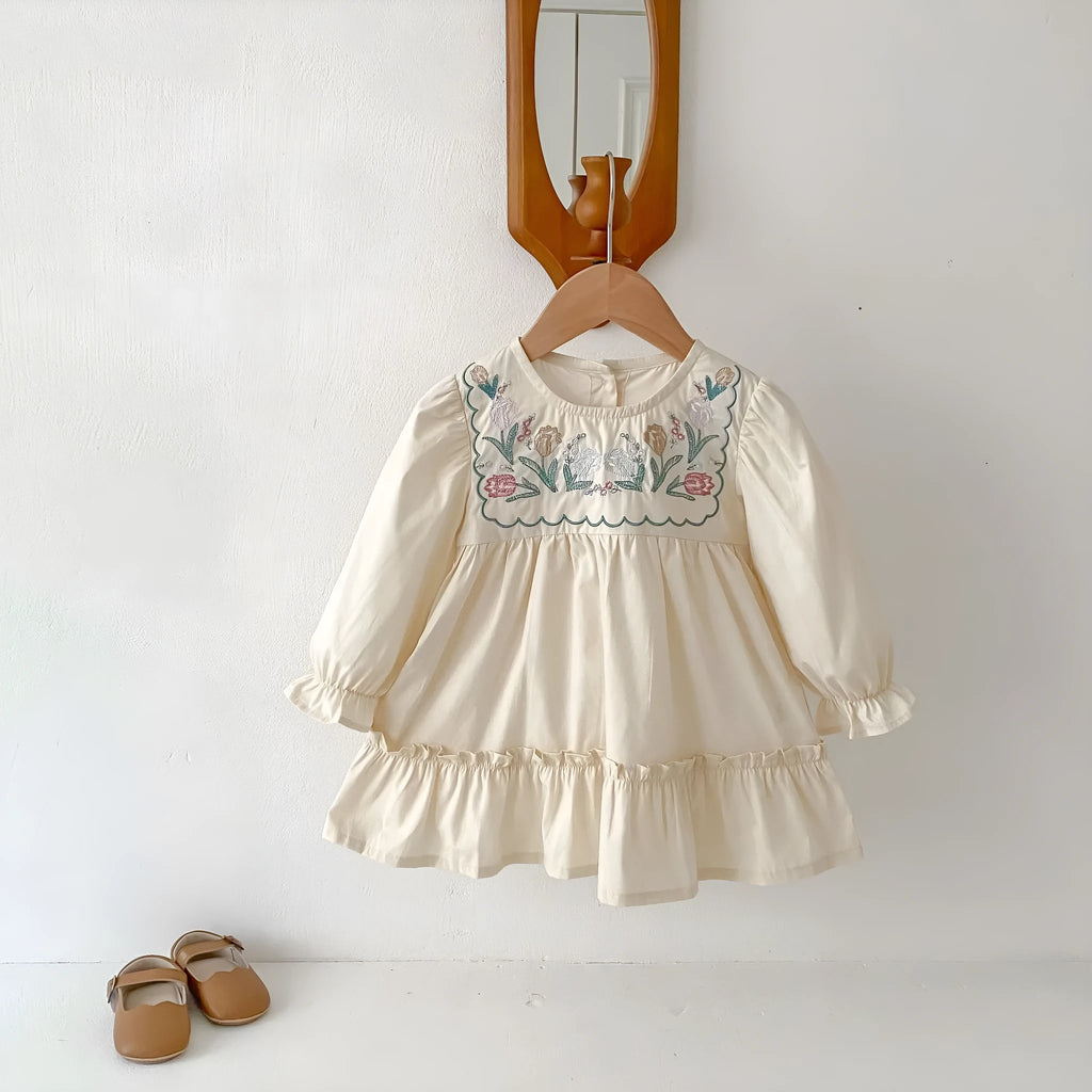 Girls' ruffled long sleeve flower embroidered princess dress in apricot colour on a child model