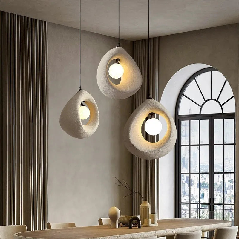 Retro modern chandelier with milky white shade hanging as pendant light