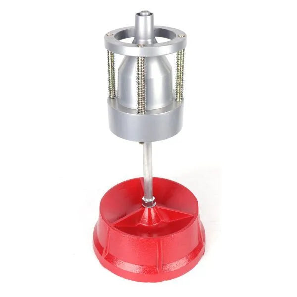Portable aluminium hub wheel balancer with bull's eye level on a black enamel finished base.