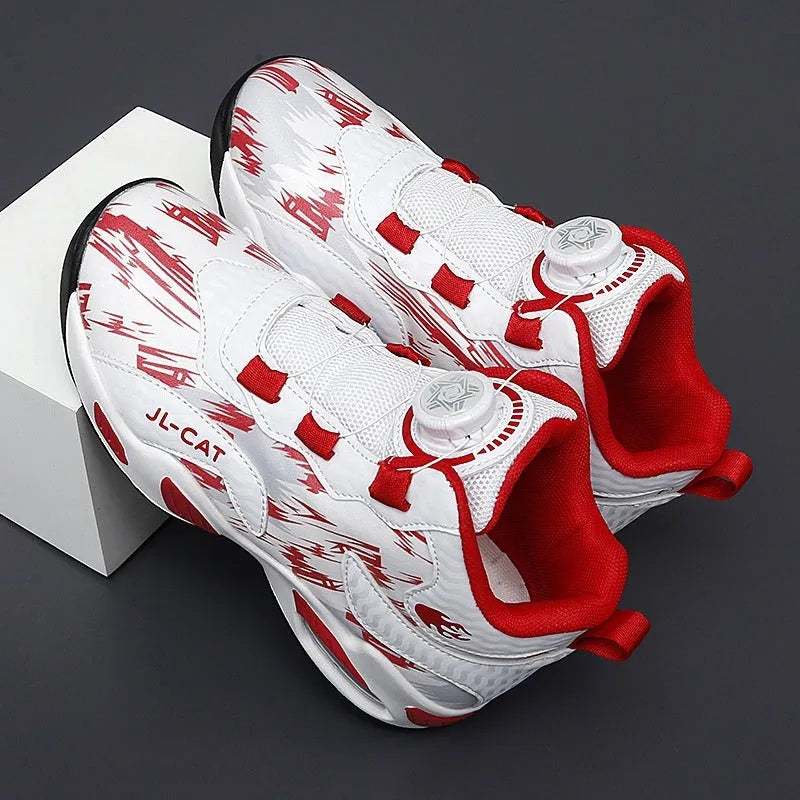Children's black running shoes with a rotating button closure and cushion basketball design on a white background.