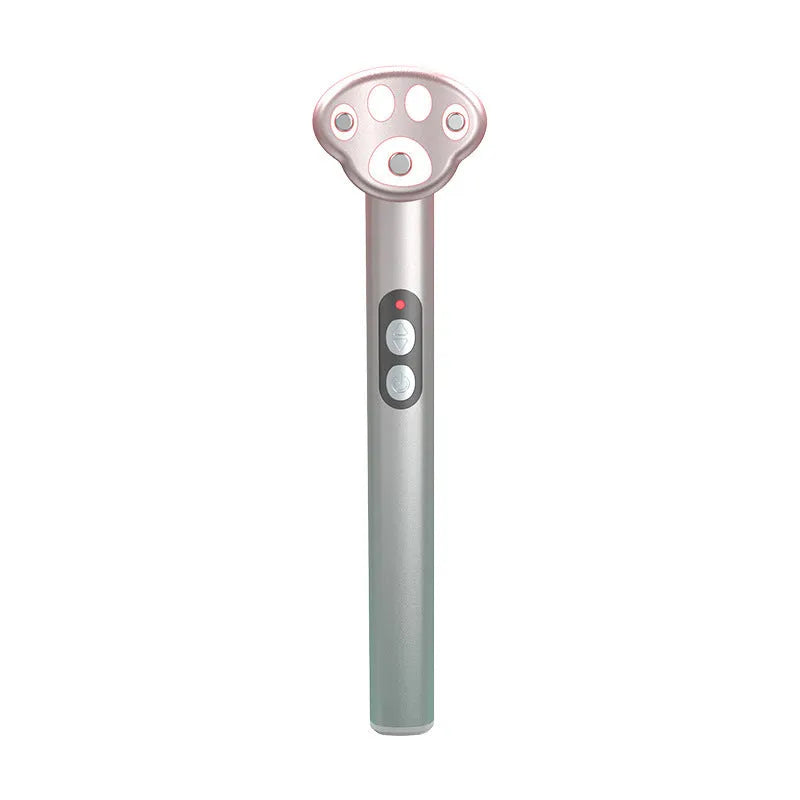 Gradient pink cat's paw shaped eye massager with micro-current technology and charging cable