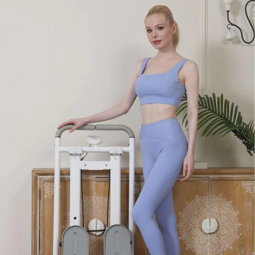 Starlight White foldable multi-function treadmill and climbing frame for home fitness.