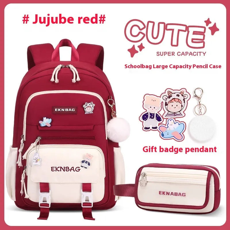 Pink waterproof Oxford cloth school backpack for girls with curved shoulder straps.