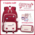 Pink waterproof Oxford cloth school backpack for girls with curved shoulder straps.