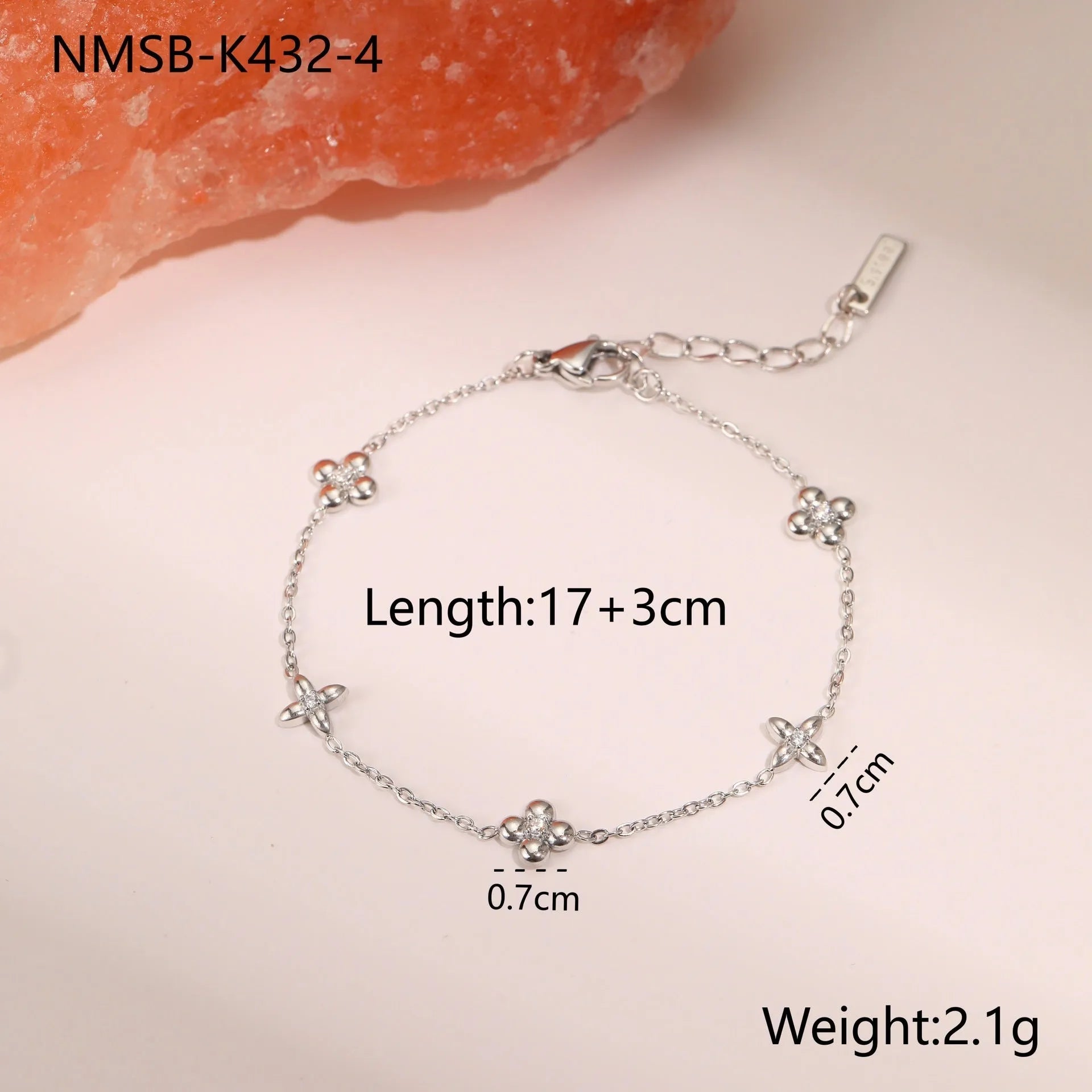 Women's stainless steel bracelet with geometric star pendant featuring hexagonal design and zircon accents
