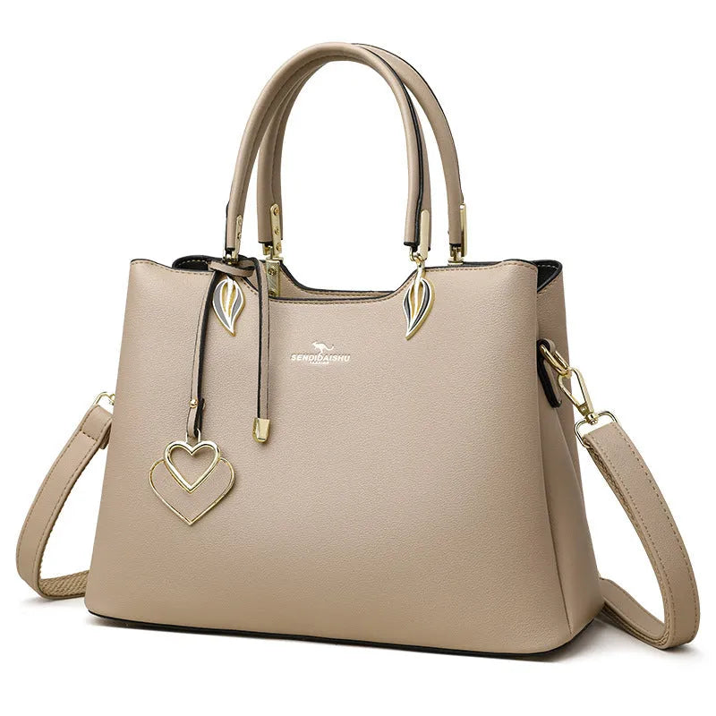 Women's PU leather messenger bag with multiple compartments and adjustable shoulder strap