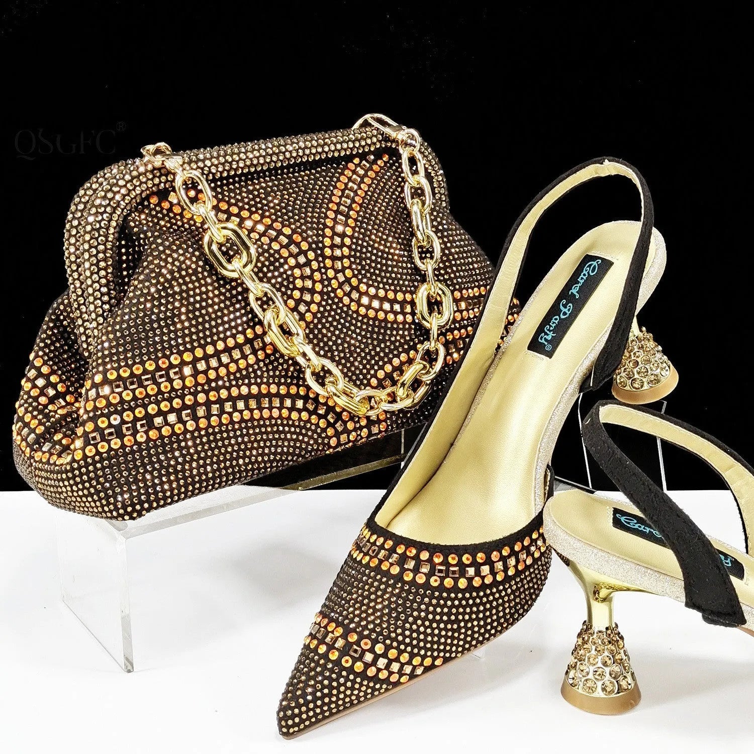 Women's pointed toe high heel shoes with matching small bag in synthetic leather, wine glass heel.