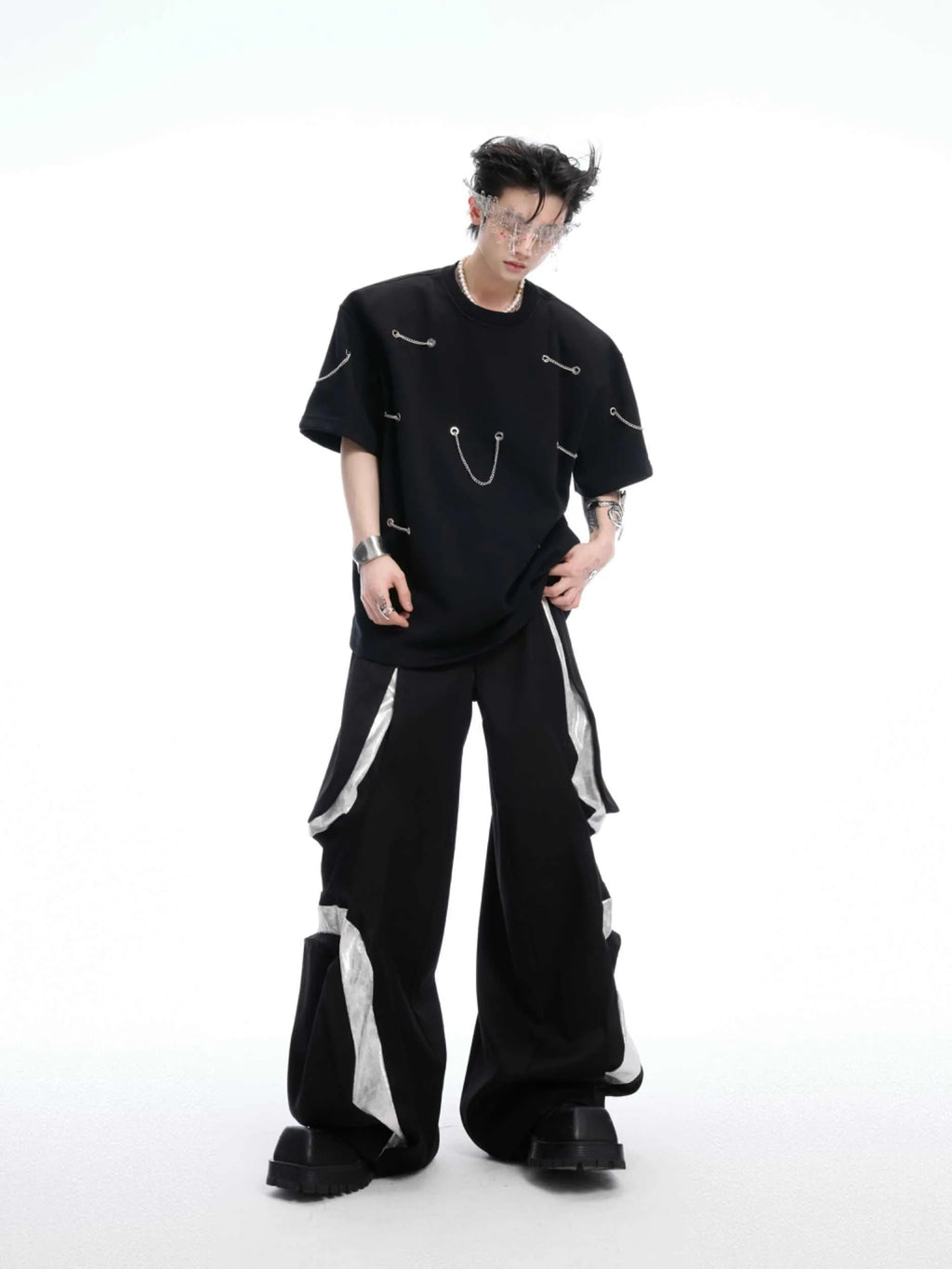 Black heavy cotton t-shirt with padded shoulder panels and silver metal chain decorative details