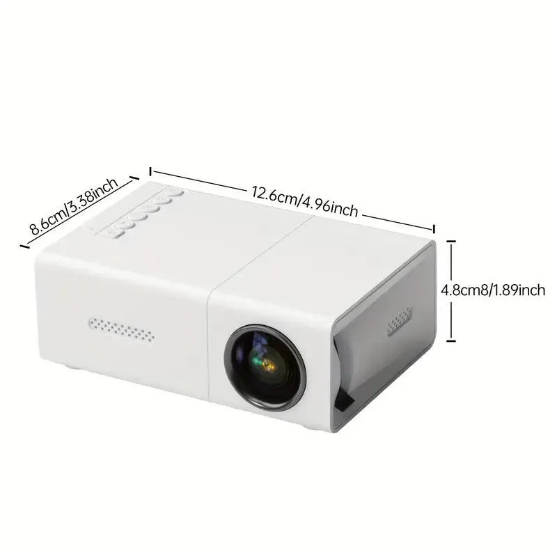 White or black M100 mini portable home projector with remote control on a table.