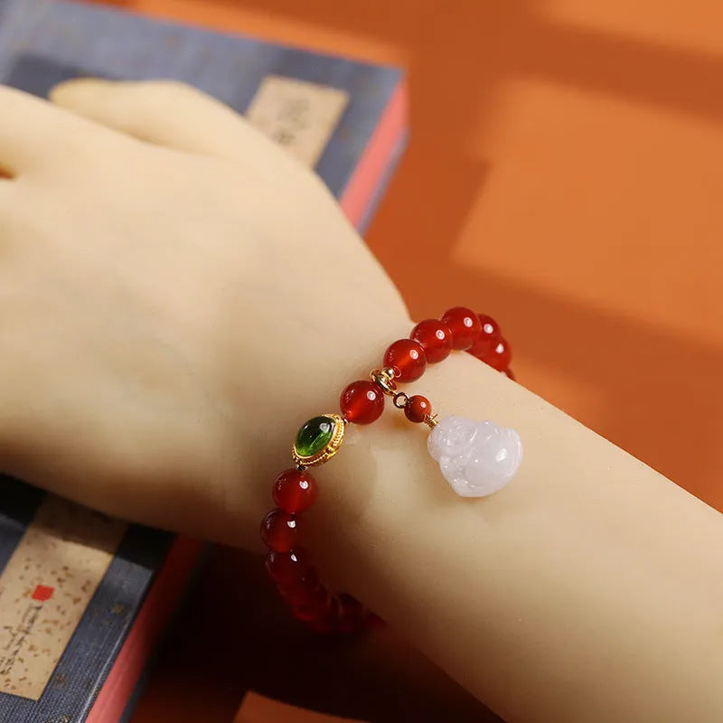 Red agate bracelet with amber geometric component and Maitreya Buddha pendant featuring ancient gold hanging jade accents