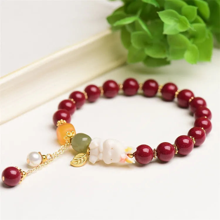 Natural cinnabar bracelet with rabbit design in traditional Chinese style