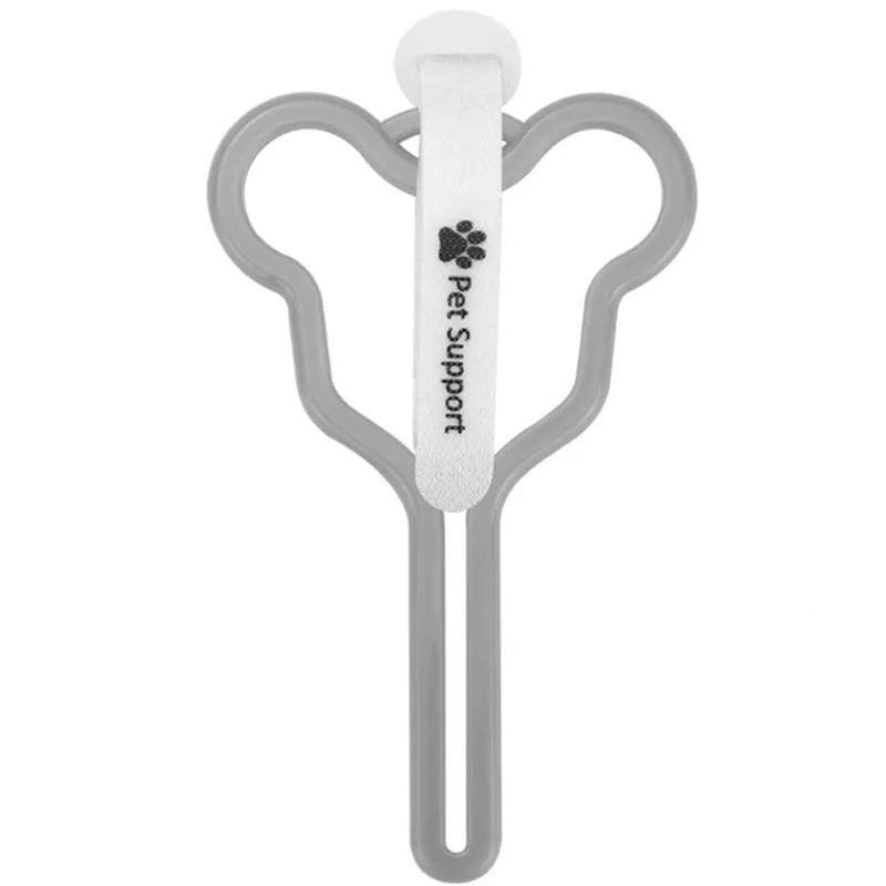 A dog poo bag holder with a hands-free clip and black Velcro strap attached to a leash.