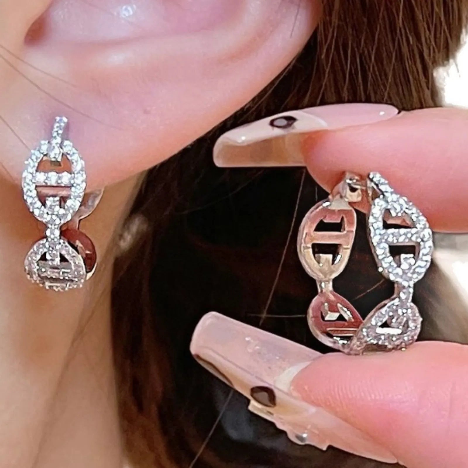 Ladies casual drop earrings with diamond design in silver, gold, or rose gold electroplated finish.