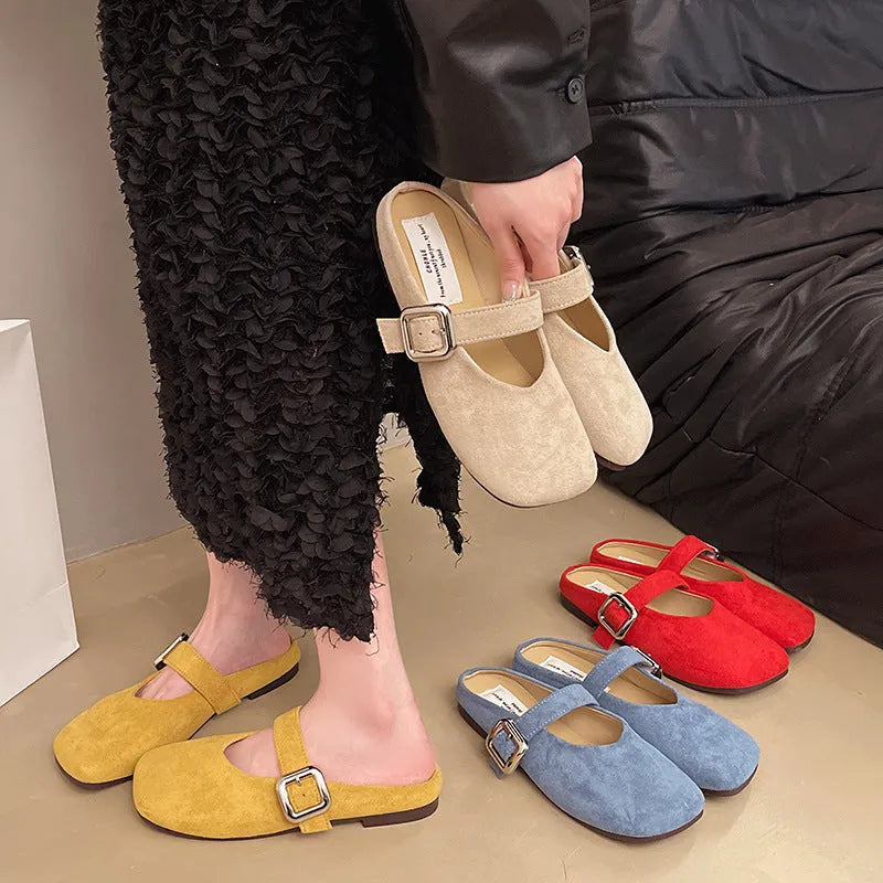 Women's flat closed-toe slippers with square toe in blue, showing PU upper and rubber sole.