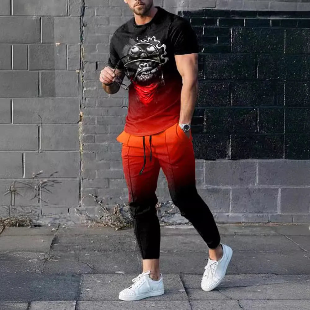Men's thin short-sleeve printed pullover and matching trousers tracksuit set on a hanger.