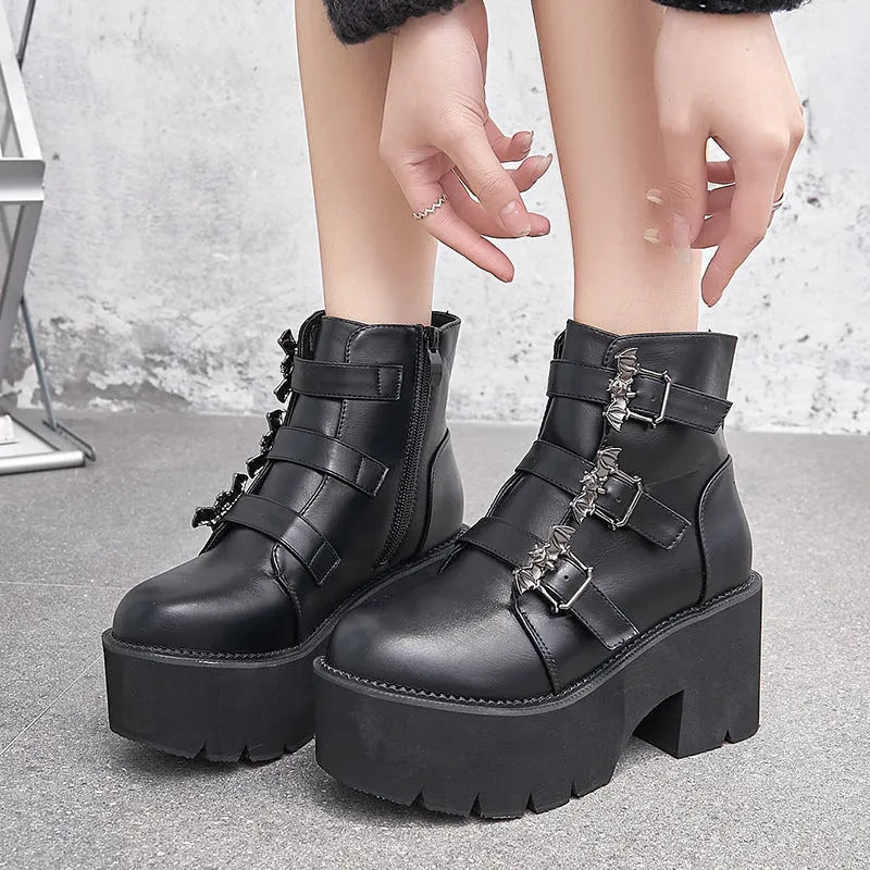 Black women's Harajuku punk Gothic Martin boots with bat buckle, side zip, and thick heel.