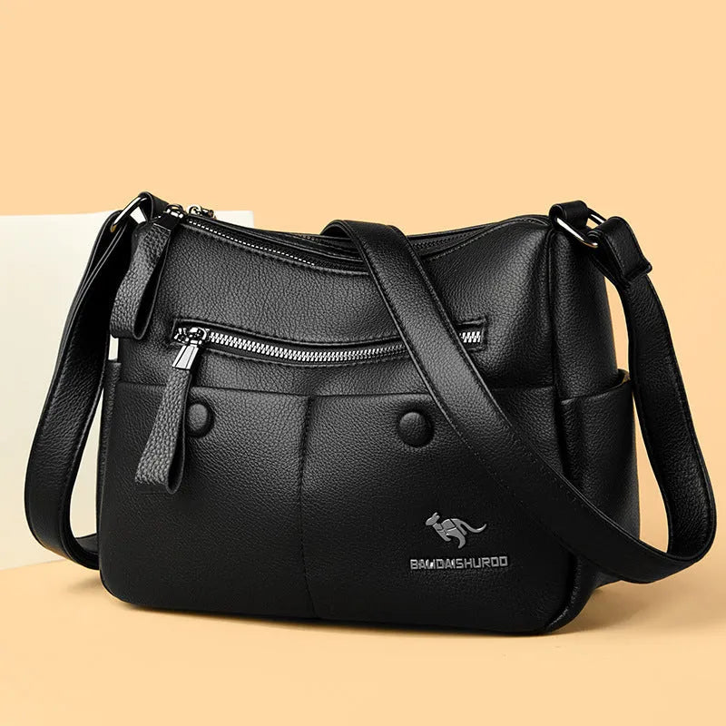 Soft PU leather crossbody bag in horizontal square shape with stitching details