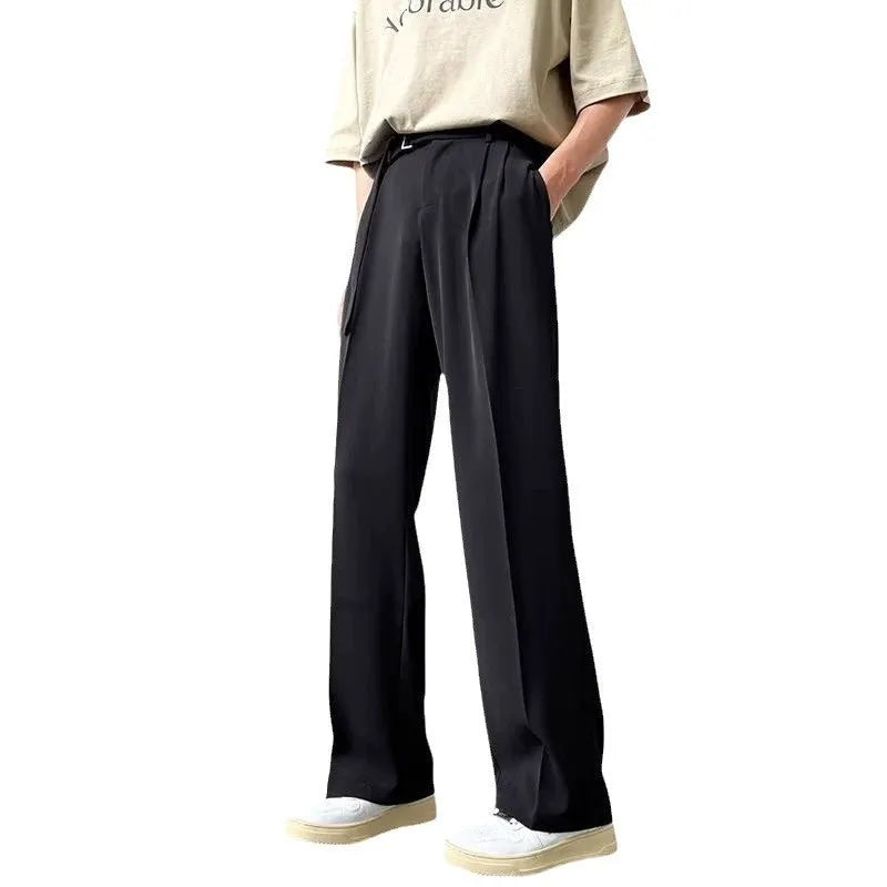 Women's thin straight wide leg trousers in black, showcasing loose fit and non-ironing fabric.